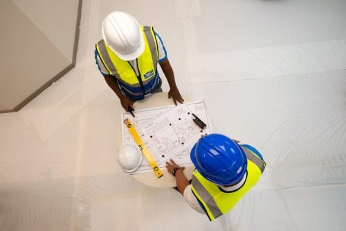 Workers planning in construction office