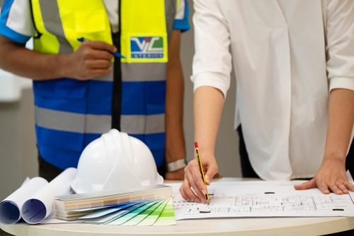 Workers discussing on projects