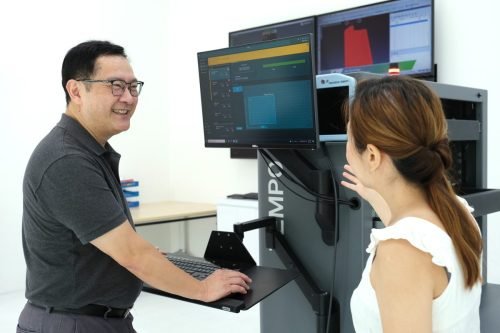 Staff discussion in lab
